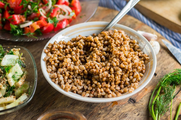 Tradtitional Russian buckwheat porridge on lunch or dinner. Vegan vegetarian food. Paleo healthy and trendy diet