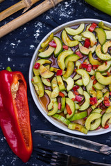 Asian cucumber red bell pepper and chilly hot pepper salad with soy sauce. Authentic Thai food menu. Raw vegan vegetarian healthy food