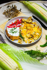 Thai fried omelet eggs with toast tofu spread for breakfast. Asian authentic food at asian cafe