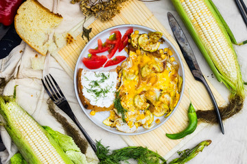Thai fried omelet eggs with toast tofu spread for breakfast. Asian authentic food at asian cafe