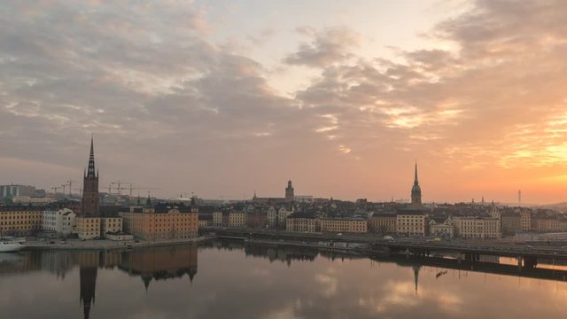Stockholm city skyline night to day sunrise timelapse at Gamla Stan and Slussen, Stockholm Sweden 4K Time Lapse