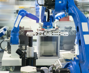 robotic hand machine tool at industrial manufacture factory,Smart factory industry 4.0 concept.