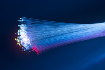 optical fibres dinamic flying from deep on technology background