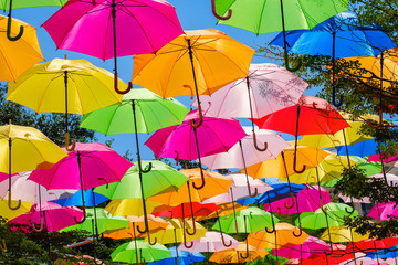 Fototapeta na wymiar Colorful hanging umbrellas in a outdoor plaza in Miami