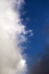 Naklejka na ściany i meble Photo background bright white big clouds