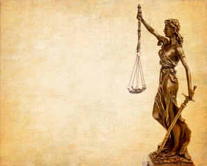 Statue of justice on old paper background, law concept