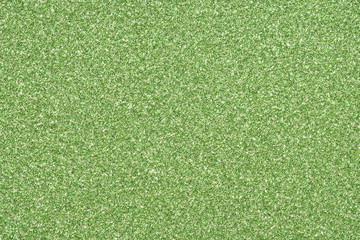 lime green sparkling glitter texture background.holiday festive backdrop.