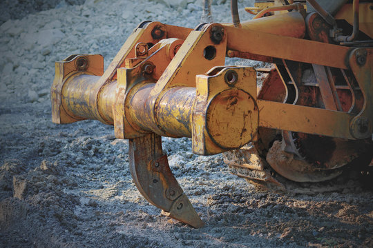 Closeup Of Ripper Or Single Shank On The Back Of The Bulldozer