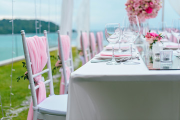 Table setting at a luxury wedding and Beautiful flowers on the table.