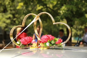 wedding hearts on the car. wedding decorations © dyageleva