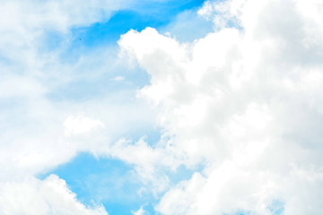 Naklejka na ściany i meble Close up view of cloud in blue sky. 