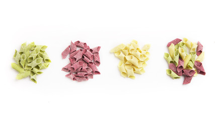 Mixture of different colorful garganelli isolated