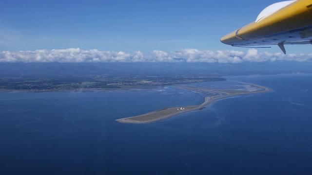 Flight in a De Havilland float plane from Victoria's Inner Harbour in BC to Seattle Washington.