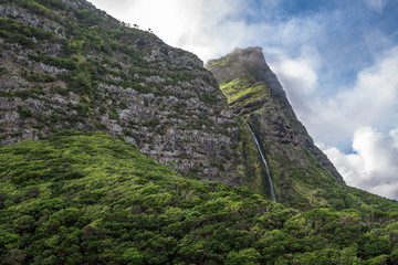 Fototapeta premium Cascata do Poço do Bacalhau, a waterfall on the Azores island of Flores, Portugal.