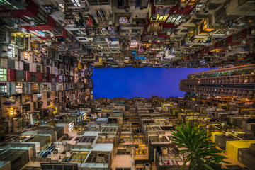 Fototapeta na wymiar Overcrowded residential building in Hong Kong