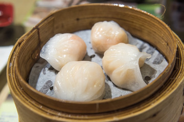Dim Sum, traditional Cantonese dumplings, cooked in bamboo steamer