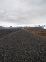 Fototapeta na wymiar Asphalt road and moutain view in Iceland