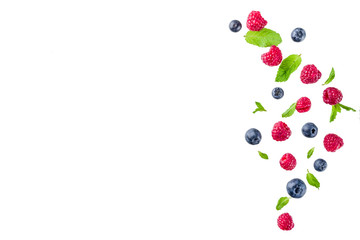 Creative layout, background, with fresh berries, simple pattern on white background. Raspberry,...
