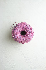 Pink donuts with sprinkles