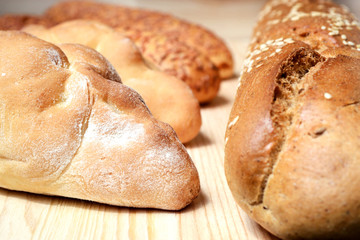 Fresh tasty pastries attract attention on wooden background