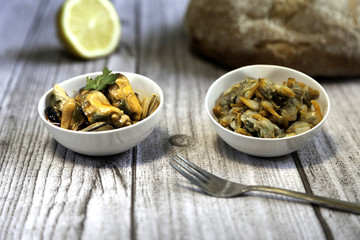 pickled mussels bowl and cockles bowl