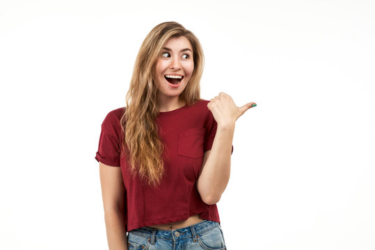 A picture of a blonde pointing her hand at your ad. 