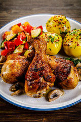 Roast drumsticks with potatoes