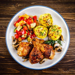 Roast drumsticks with potatoes