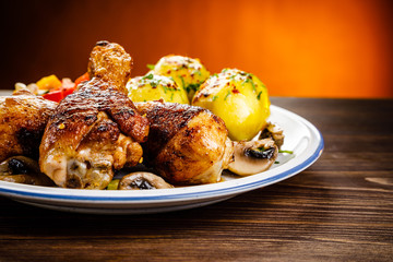 Roast drumsticks with potatoes