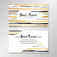 Vector business card template with hand painted golden and black brush stripes on white background.