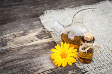 Calendula flower essential oil. Naturopathy. Herbal medicine.