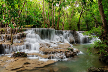 Beautiful waterfall in tropical rainforest at Kanchanaburi province, Thailand