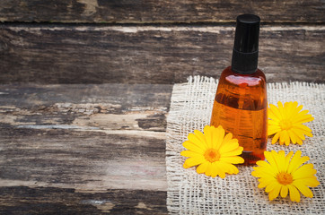 Calendula flower essential oil. Naturopathy. Herbal medicine.
