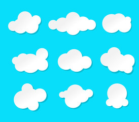 Set of cartoon clouds isolated on a blue background. paper art vector illustration.