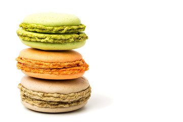 Three macaroons multicolored on a white background.