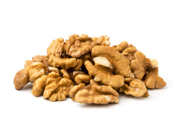 Pile of peeled walnuts, closeup.
