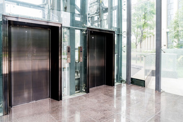 Three lift doors in office building