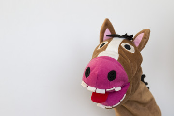 the funny donkey puppet show on the white background for school activity time. 