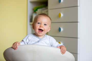 Image of sweet baby boy, closeup portrait of child, cute toddler with blue eyes