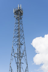 Telecommunication transmitter on metal construction.