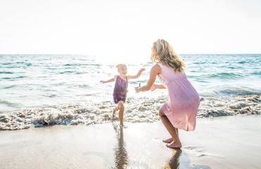 Mom and daughter playing