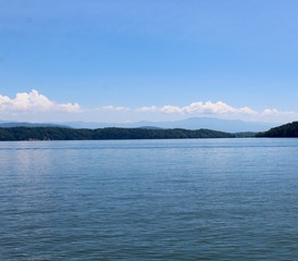 A beautiful sunny day at the lake in the summertime.