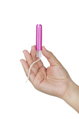 female hand holds a tampon with applicator isolated on white
