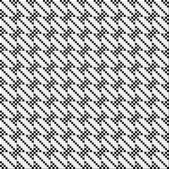 Seamless geometric textured pattern in small cage in black and white colors