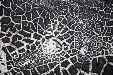 The surface texture with cracked black tar
