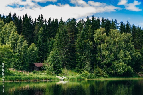 Summer Cottage Or Log Cabin By The Blue Lake In Rural Finland