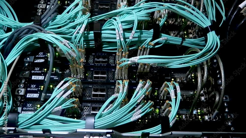 Poster back panel of powerful servers installed in the rack of the server room of the data center