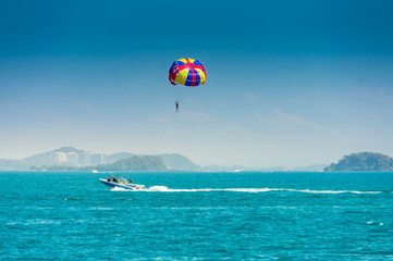 The sea and beautiful sky of Rayong Thailand is popular among people in play activity Parachute, Beautiful nature background
