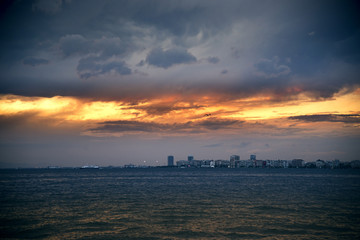 Aegean sea and Izmir bay and on cloudy sunset.