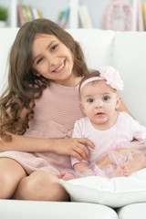 two beautiful cute sisters